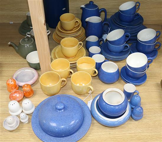 A collection of Moorcroft dinner ware, yellow, green and mixed coloured cruets
